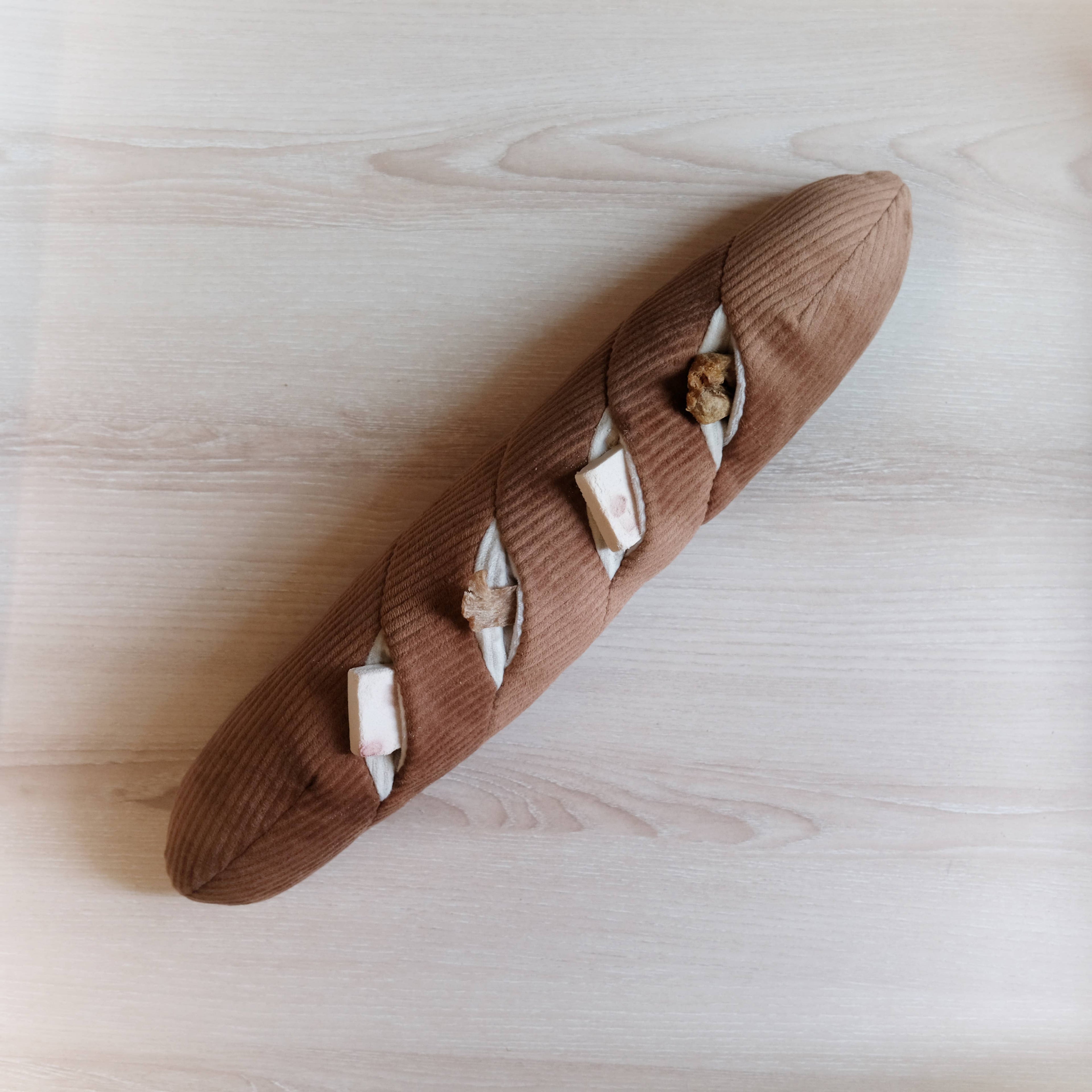 Baguette enrichment dog toy